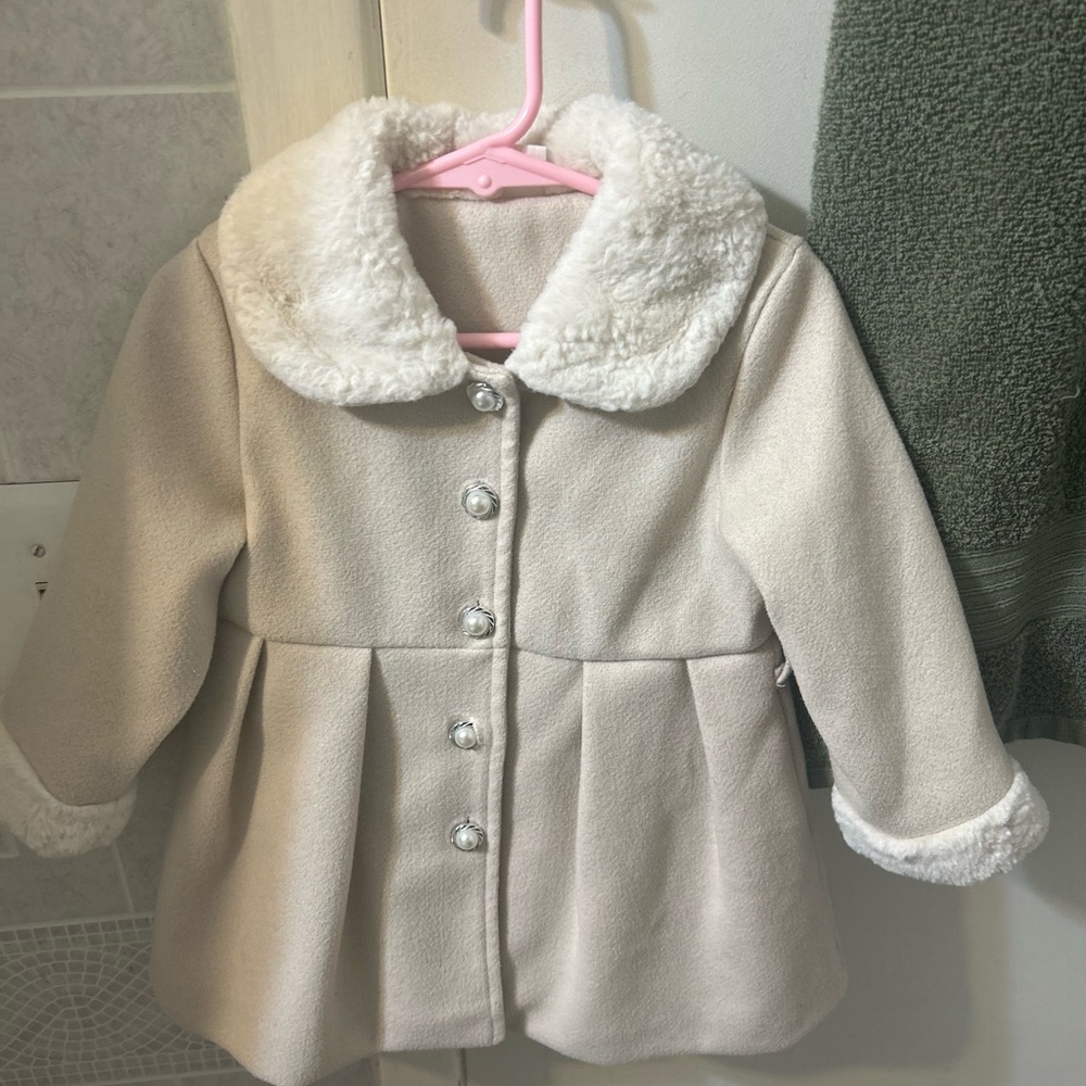 A beige overcoat